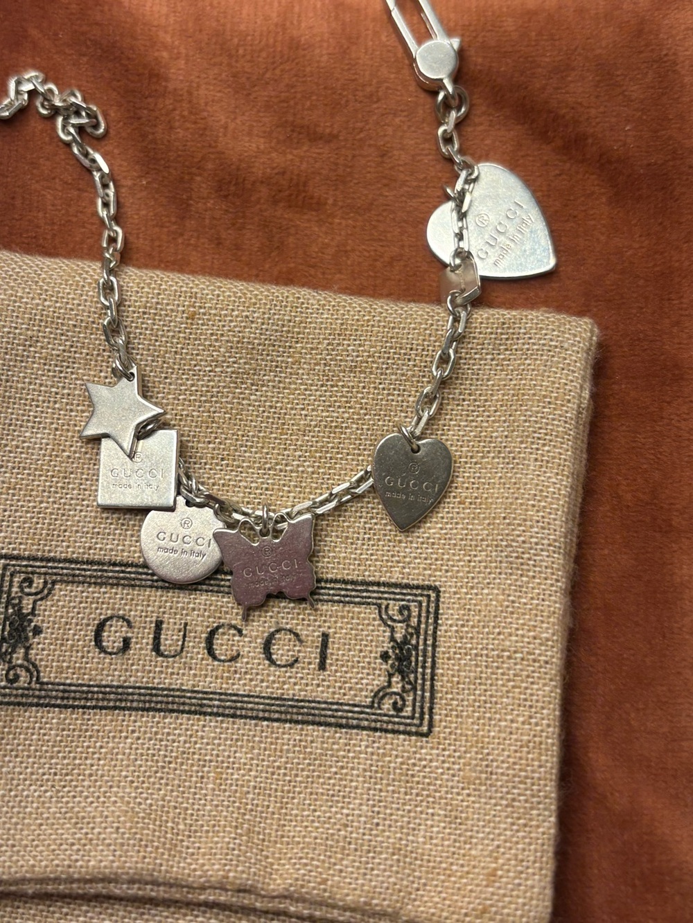 Gucci Silver Heart and Star Charm Bracelet with Pink Star Accent